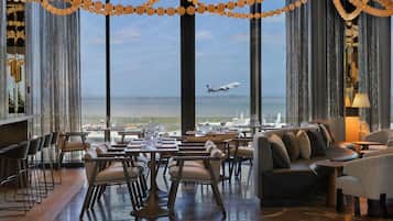 Breakfast, lunch, dinner served; local and international cuisine