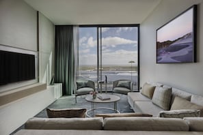 Executive Suite, 1 King Bed | Living area | 55-inch Smart TV with digital channels, streaming services
