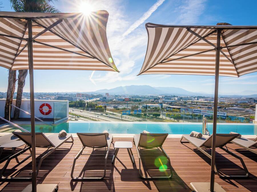 Seasonal outdoor pool, pool umbrellas, pool loungers