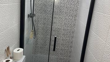 Hair dryer, towels, soap, toilet paper