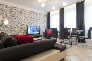 Deluxe Apartment | Living area | DVD player