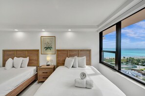 2 habitaciones, tabla de planchar con plancha y cuna de viaje
