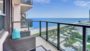 A balcony with a view of the beach and ocean. - Ocean View Retreat / Beach Service / 1603 (Miami Beach)