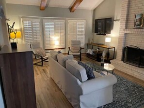 Smart TV, fireplace, books