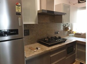 Fridge, microwave, toaster, cookware/dishes/utensils