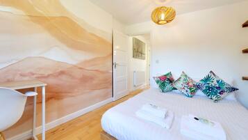 1 bedroom, desk, iron/ironing board, travel cot