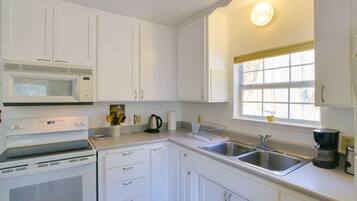 Fridge, microwave, stovetop, coffee/tea maker