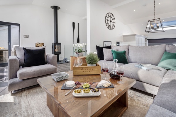 Scandanavian Style Open plan living area with stunning Lake & Garden Views.