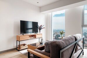 Superior Apartment | Living room | 50-inch Smart TV with digital channels - Nido GDL (Guadalajara)