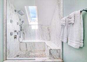 Shower, hair dryer, towels, soap
