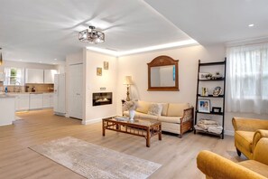 Smart TV, fireplace, books