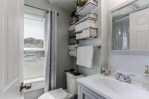 Hair dryer, towels, soap, shampoo