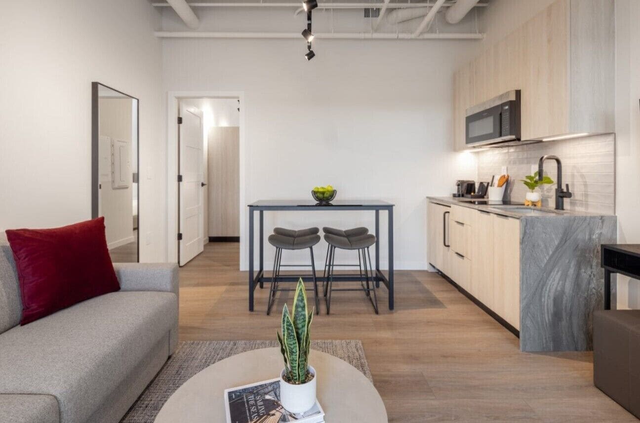 Waterfront Junior One Bedroom Suite | Living area | 55-inch Smart TV with cable channels