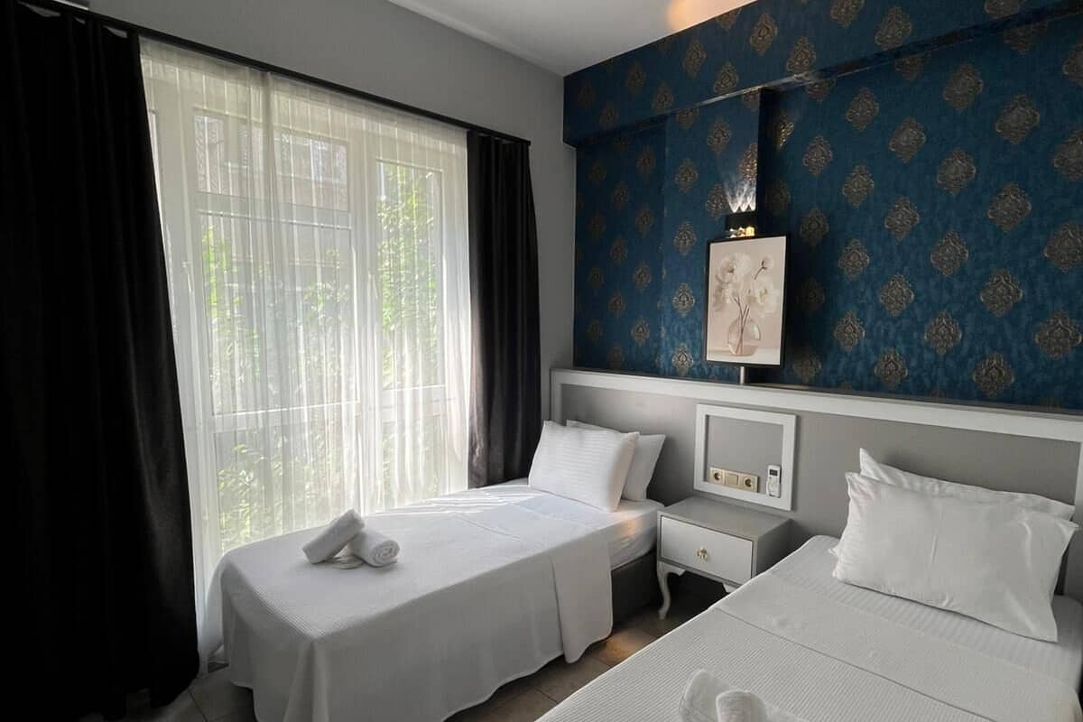 Premium bedding, down duvets, memory-foam beds, minibar