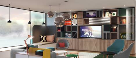 A modern living room with a sofa, chairs, a TV, and a bookshelf.