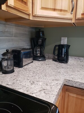 Fridge, microwave, oven, stovetop -  The Bear Den Cabin with pond view. (Langsville)