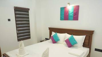 Perhehuoneisto | Ylelliset vuodevaatteet, pillowtop-patjalliset sängyt