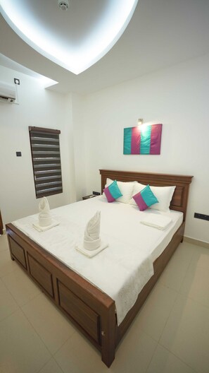 Family Apartment | 1 bedroom, premium bedding, pillow-top beds, individually furnished