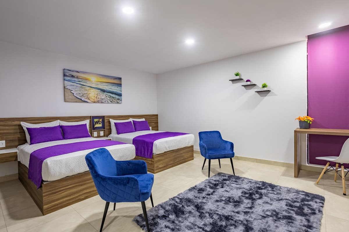 Superior Quadruple Room | In-room safe, desk, laptop workspace, iron/ironing board