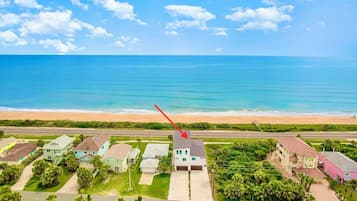On the beach, sun-loungers, beach towels