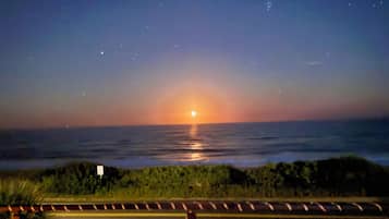 On the beach, sun loungers, beach towels