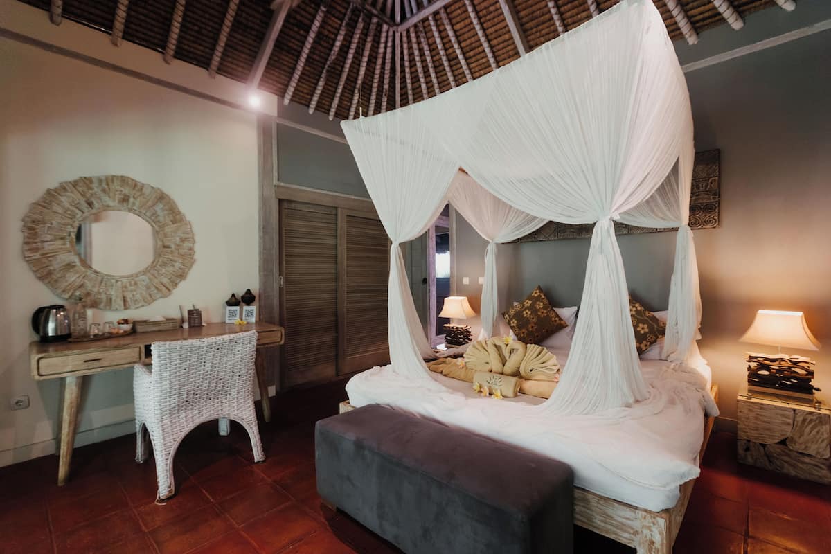 Deluxe bungalow, 1 kingsize bed, uitzicht op tuin | Luxe beddengoed, donsdekens, pillowtop-bedden, een kluis op de kamer