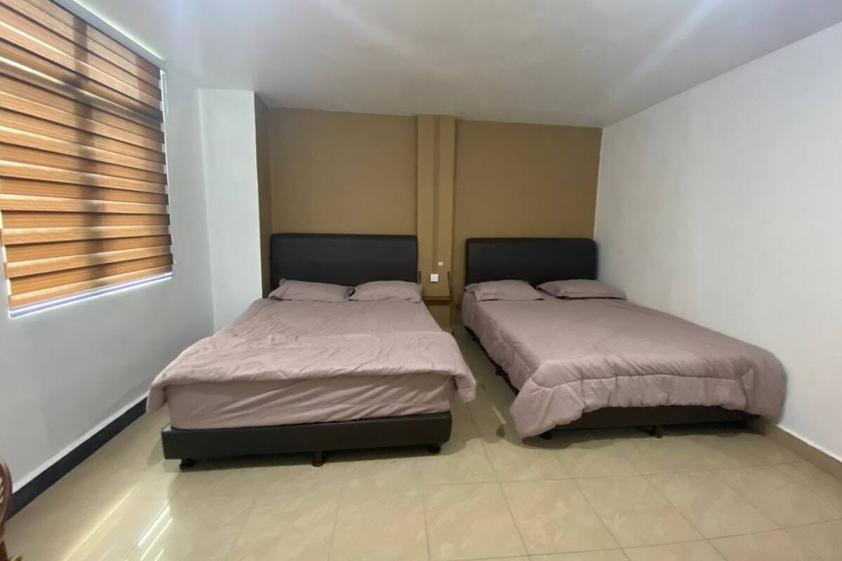 Suite Premium | 1 habitación y ropa de cama