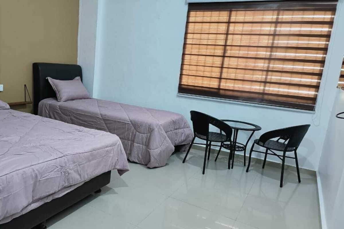 Habitación triple Deluxe | 1 habitación y ropa de cama