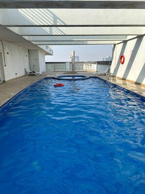 Balcony - Luxurious 1 Bedroom Apartment in Red Residency Sport City Dubai (Dubai)
