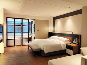 Habitación Business individual, 1 cama de matrimonio grande | Cortinas opacas, wifi gratis, ropa de cama