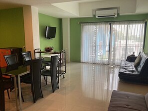 Family Suite, Pool View | Living area | 46-inch LCD TV with cable channels - Stay Resort Pattaya (Pattaya)