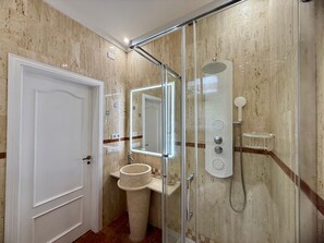 Bathtub, hair dryer, towels