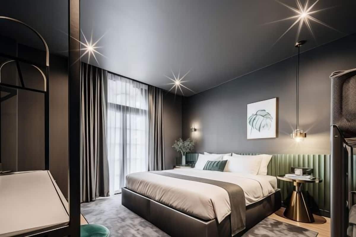 Premium bedding, individually furnished, blackout curtains, free WiFi