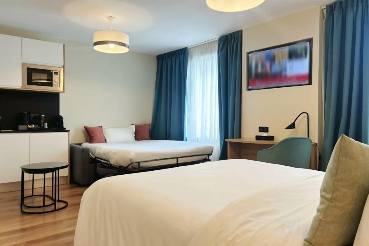 In-room safe, desk, laptop workspace, blackout curtains