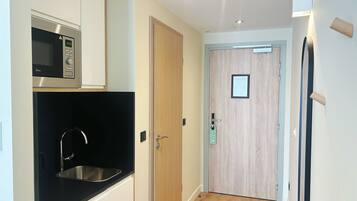 Standard Room, 2 Twin Beds, City View | In-room safe, desk, laptop workspace, blackout drapes