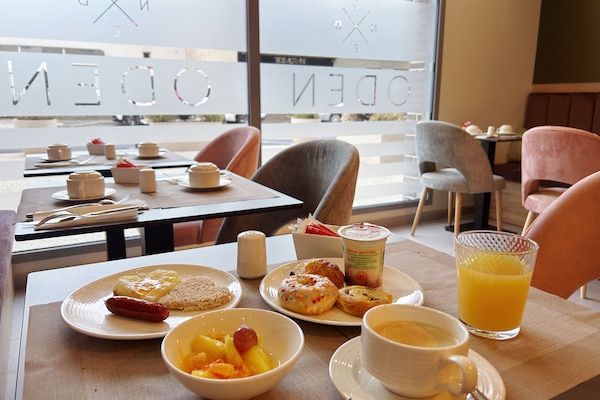 Daily buffet breakfast (EUR 14 per person)