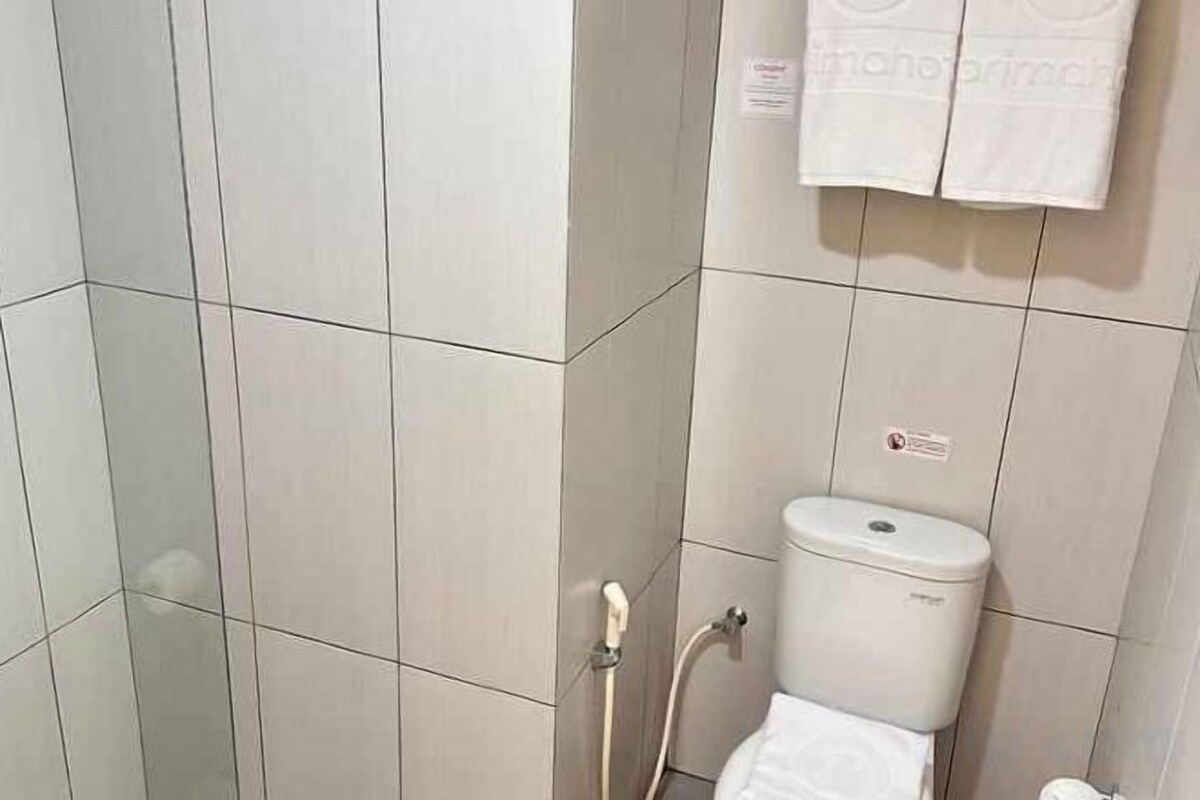 Badkamer | Gratis toiletartikelen, pantoffels, een bidet