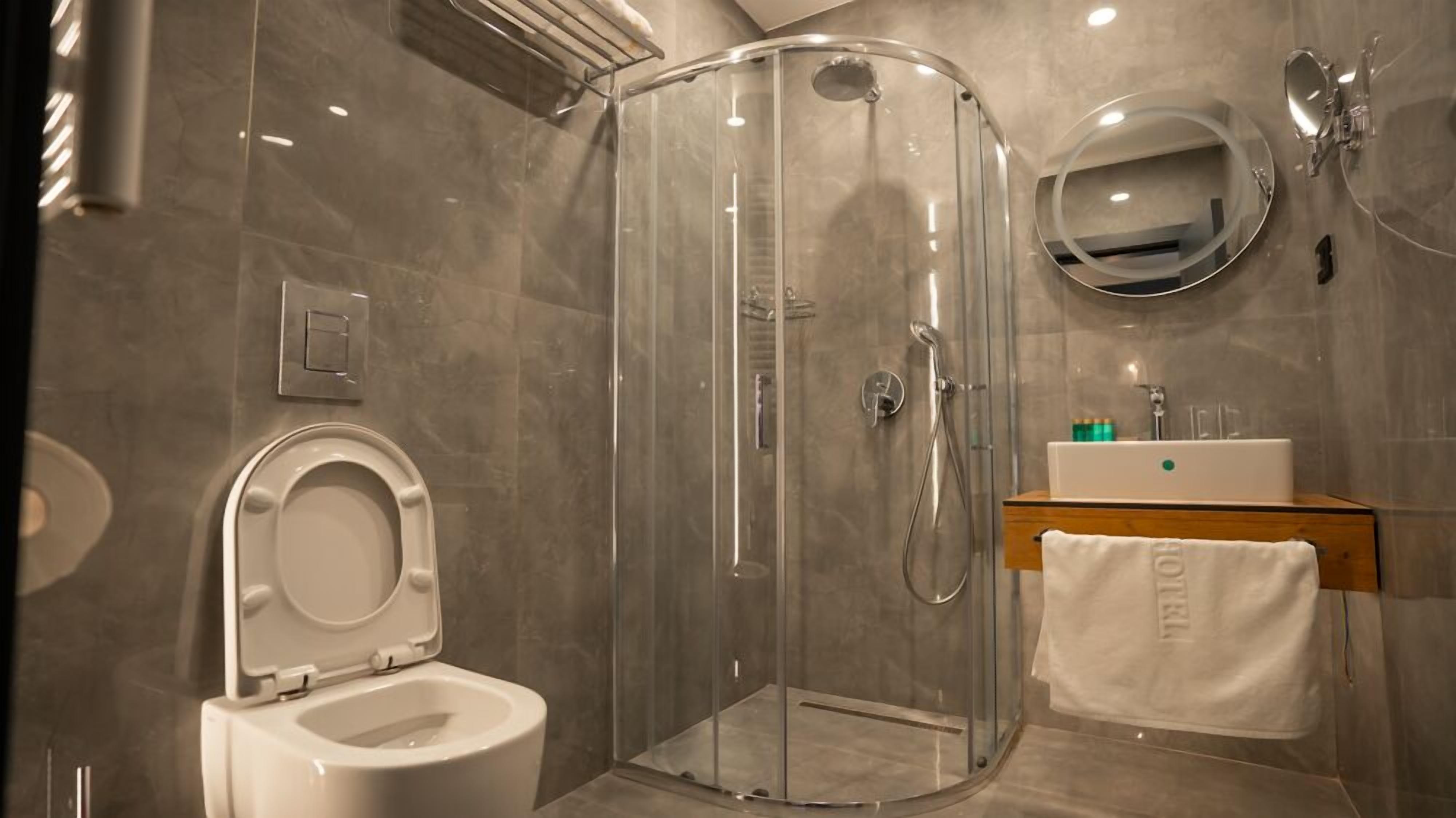 luxury room | bathroom | free toiletries, hair dryer, bathrobes, slippers