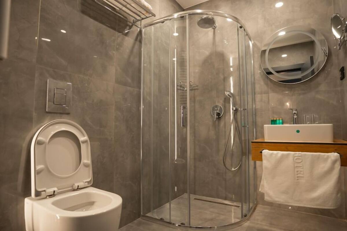 luxury room | bathroom | free toiletries, hair dryer, bathrobes, slippers