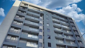 A modern multi-story building with balconies and large windows. - Premium Space In Santiago- 5 Min Away From Airport (Puñal)