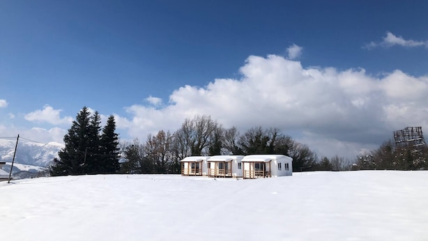 A snow-covered landscape with a small cabin structure. - Functional Mini Luxury Lodges Near Camerino (Camerino)