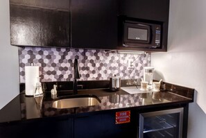 Microwave, coffee/tea maker, cookware/dishes/utensils, paper towels