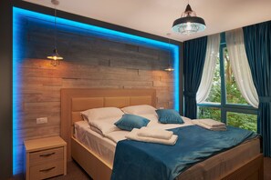 Habitación Deluxe doble | Cortinas opacas y sistema de insonorización