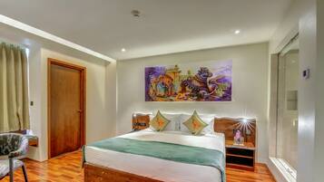 A bedroom with a wooden bed, a nightstand, a chair, a painting on the wall, and a window.