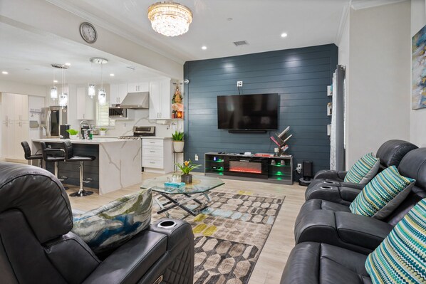 Smart TV, fireplace, books