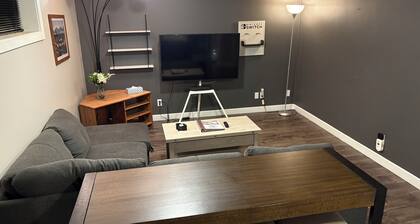 Spacious 1 bedroom basement suite with free parking near CFB, RMC & Downtown.