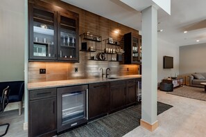 Enjoy cooking in this well-equipped kitchen with an oven, stainless steel appliances, and ample countertop space.