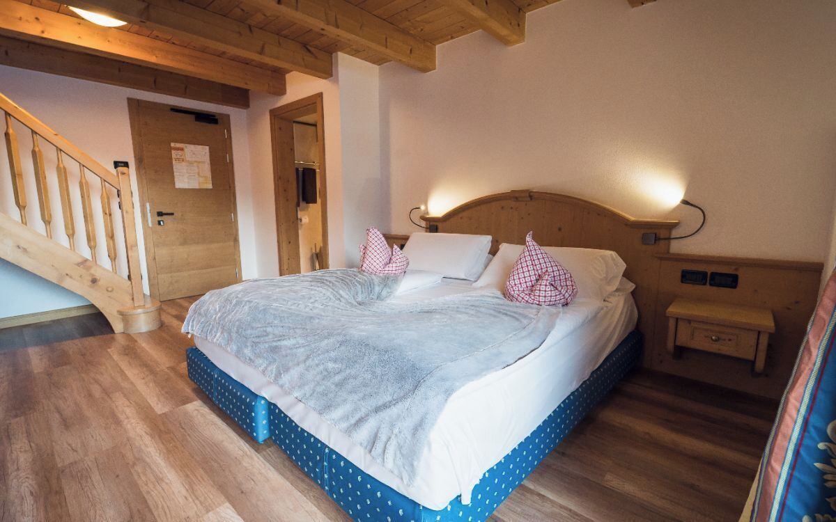 Suíte família | Edredons de pluma, escrivaninha, quartos à prova de som