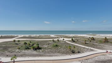 On the beach, sun loungers, beach towels