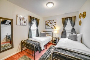 2 habitaciones, tabla de planchar con plancha y ropa de cama 